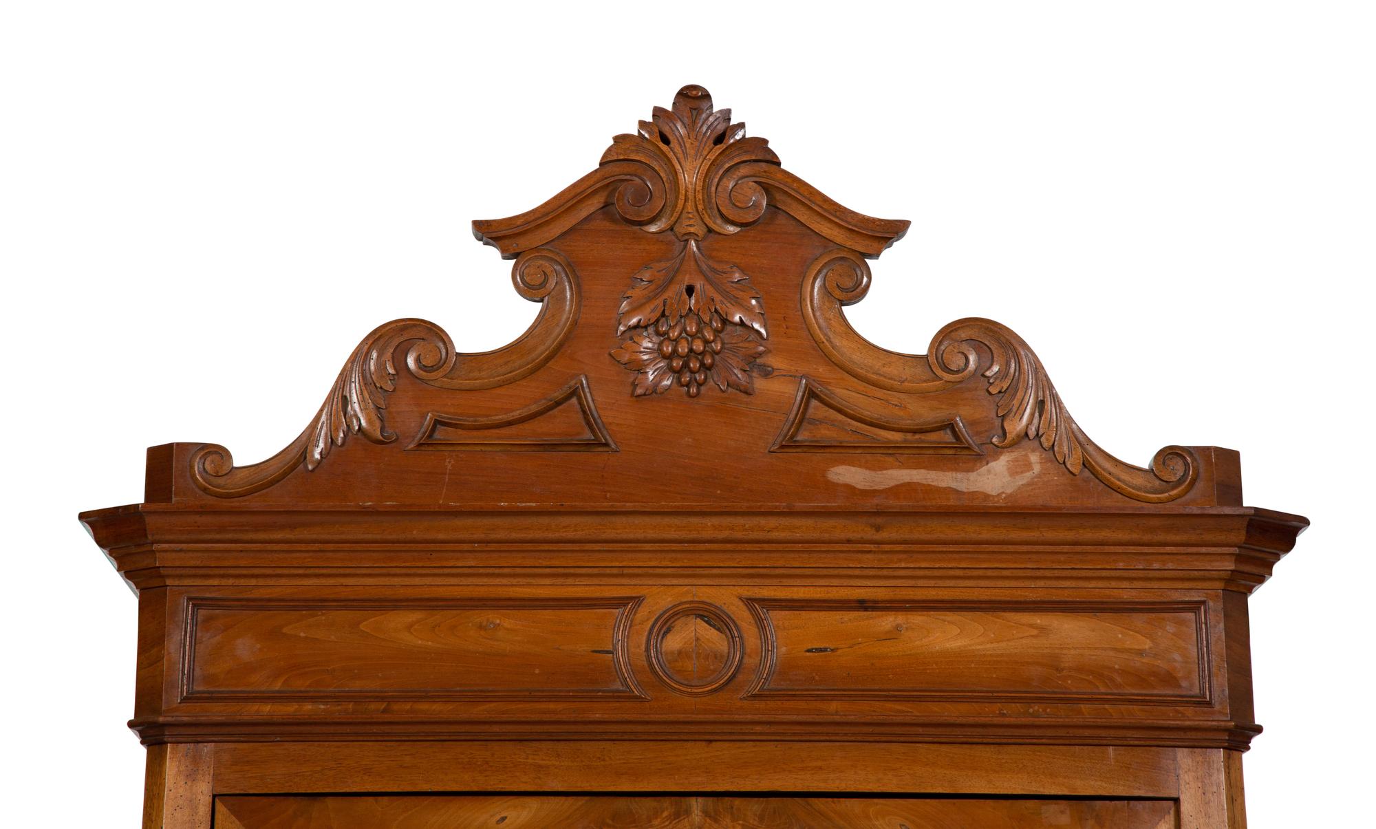An Italian Figured Walnut Wardrobe Cabinet