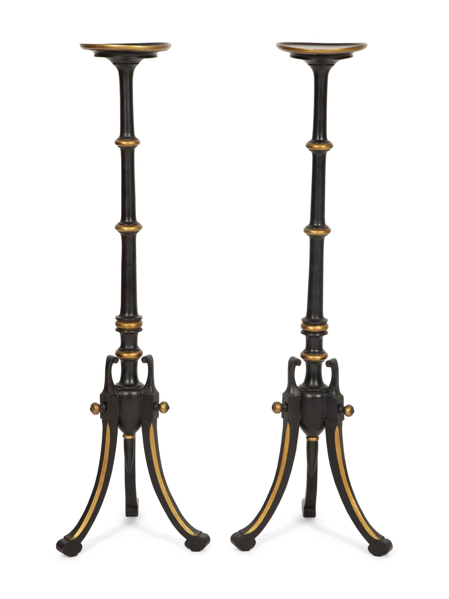 A Pair of Regency Style Painted and Parcel Gilt Tripod Stands