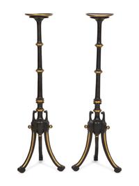 A Pair of Regency Style Painted and Parcel Gilt Tripod Stands