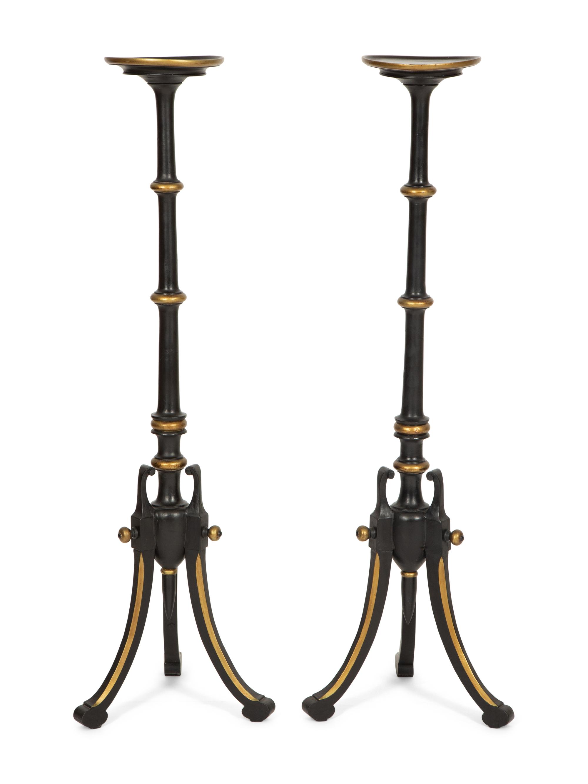 A Pair of Regency Style Painted and Parcel Gilt Tripod Stands