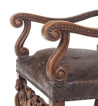 An Italian Baroque Tooled Leather-Upholstered Armchair