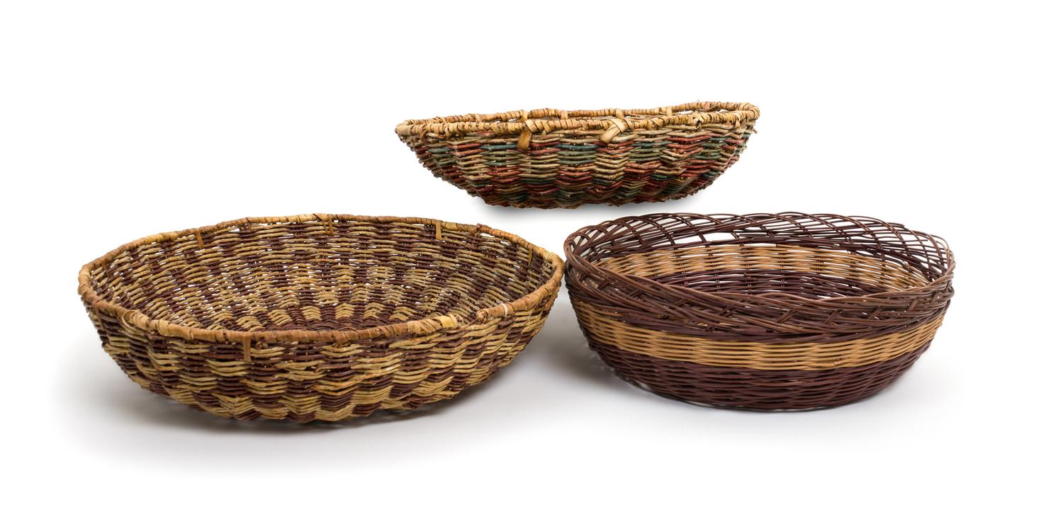 Eight Hopi Basket Trays Diameter 14 1/4 inches.