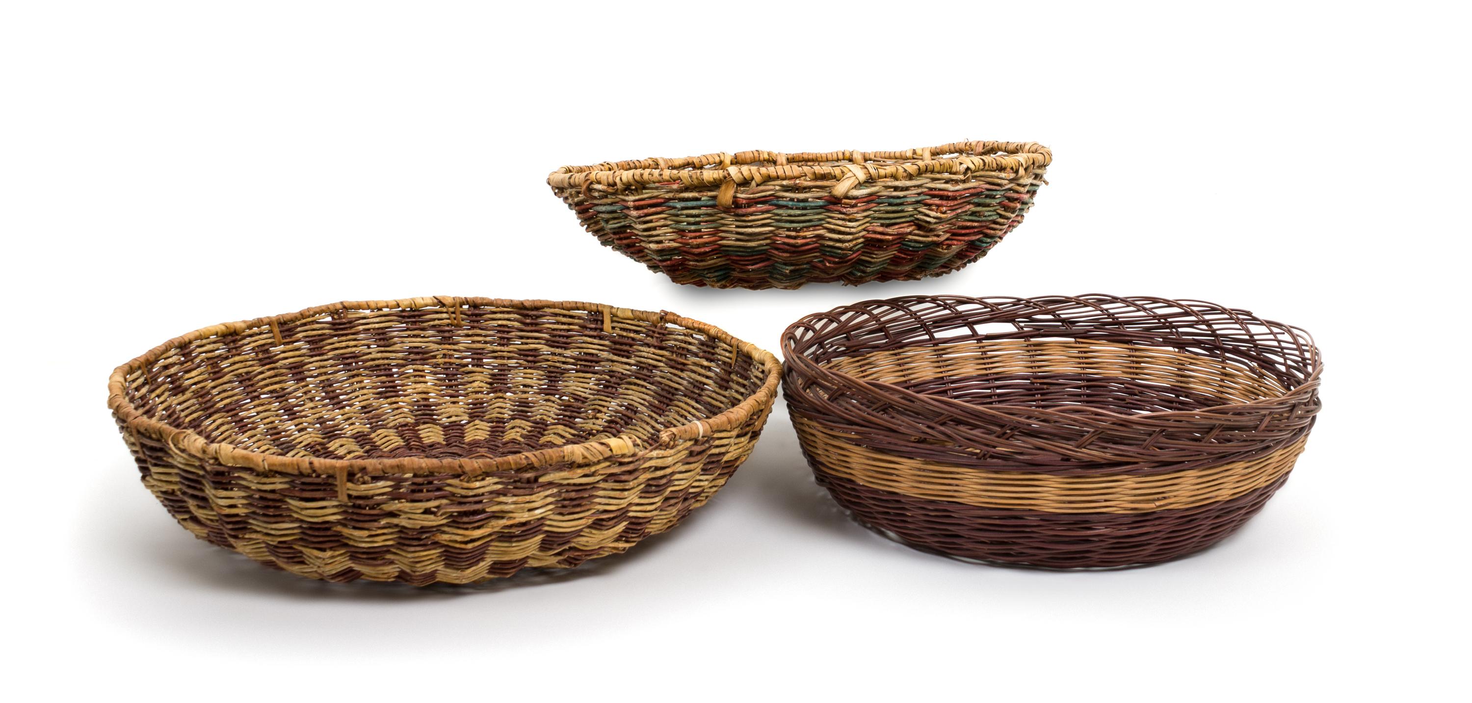 Eight Hopi Basket Trays Diameter 14 1/4 inches.