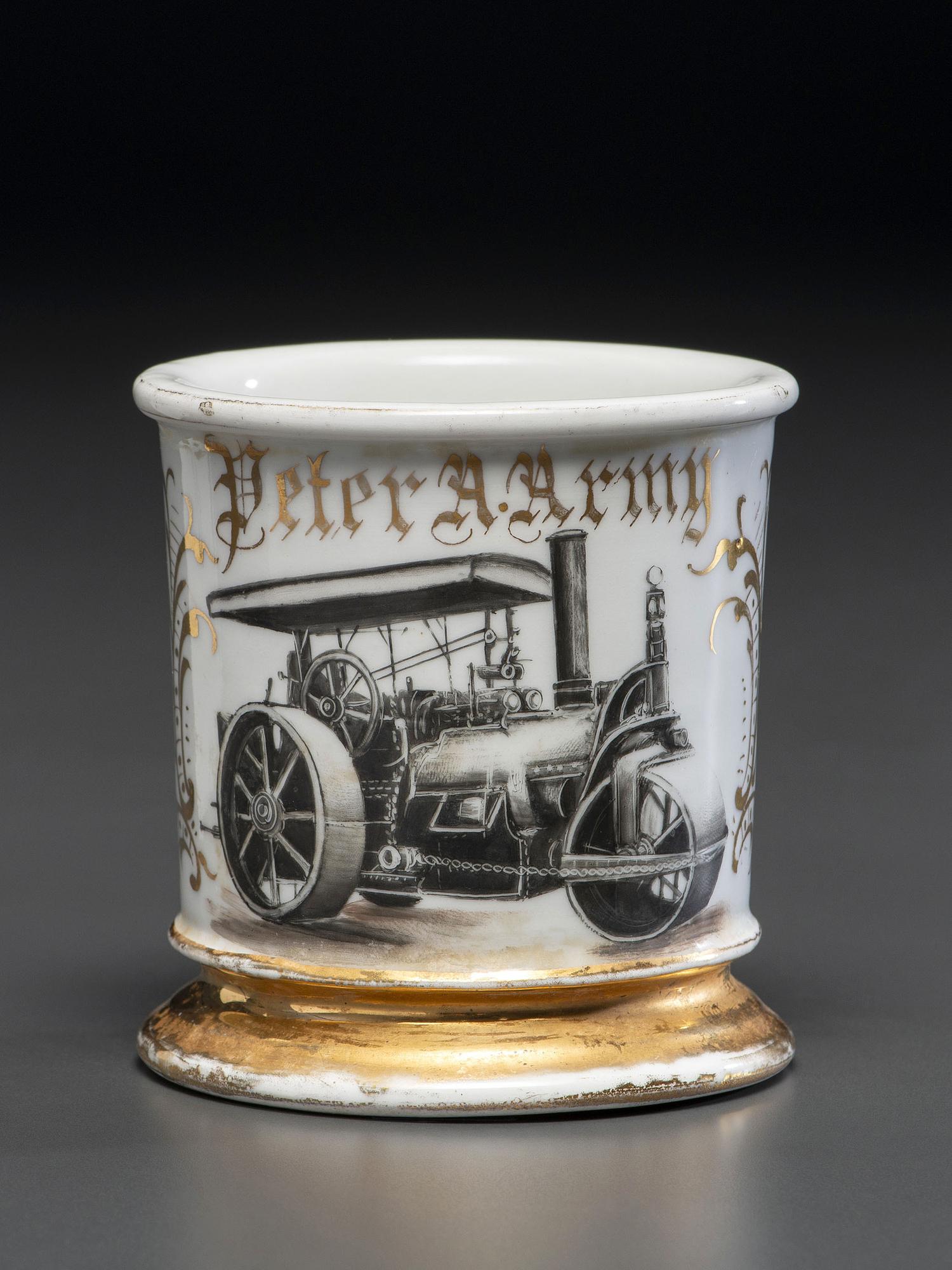 A Porcelain Shaving Mug Depicting a Steam Roller
