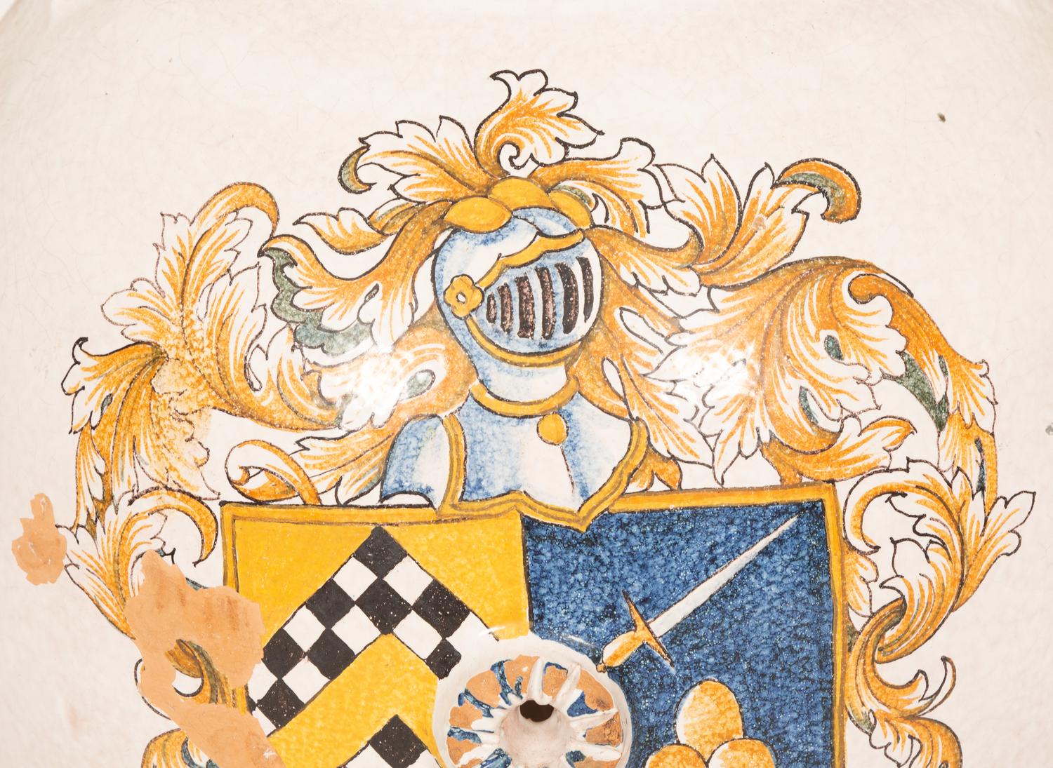 An Italian Glazed Terracotta Olive Jar with Painted Armorial