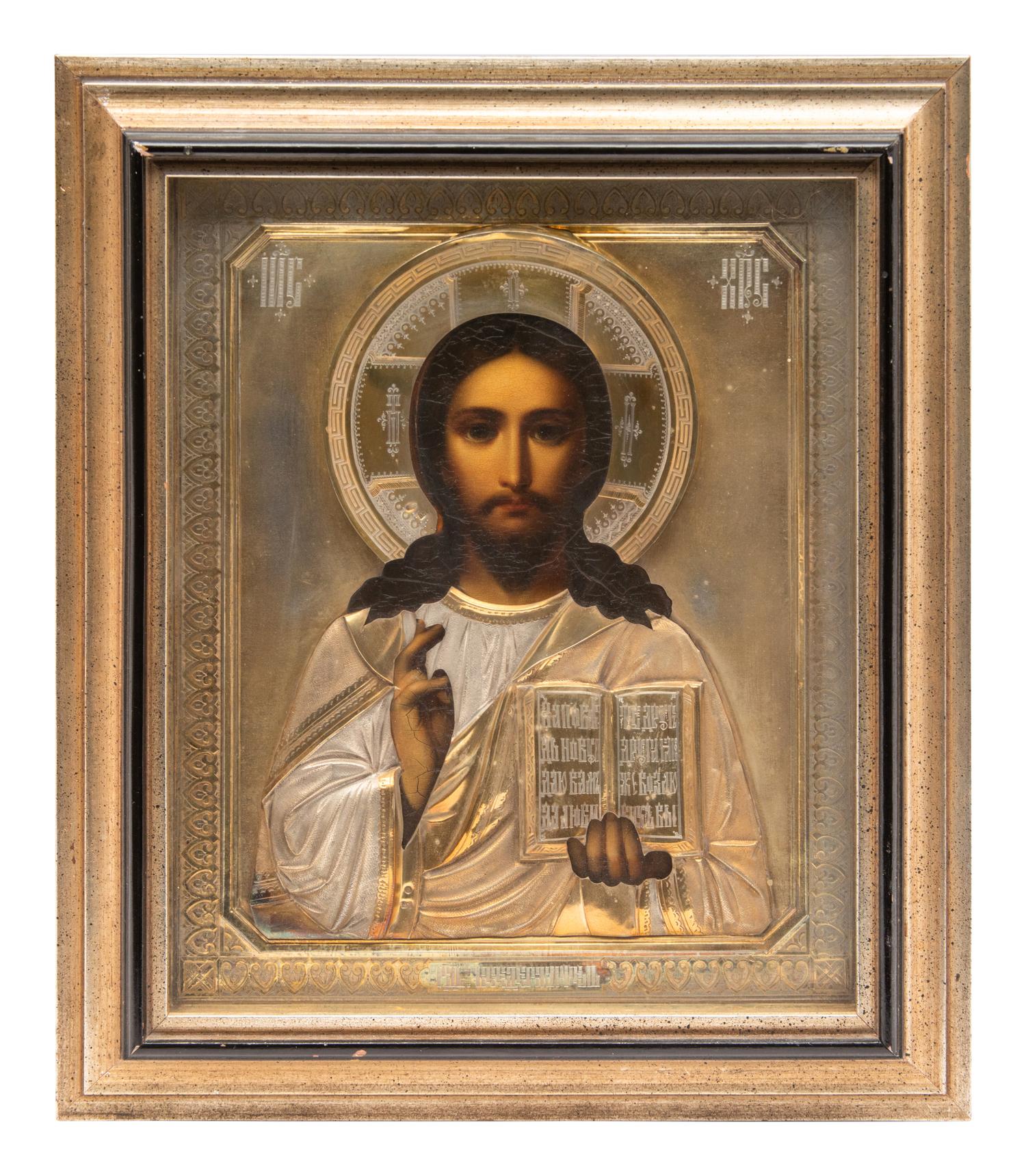 A Group of Three Russian Enameled Oklad Icons