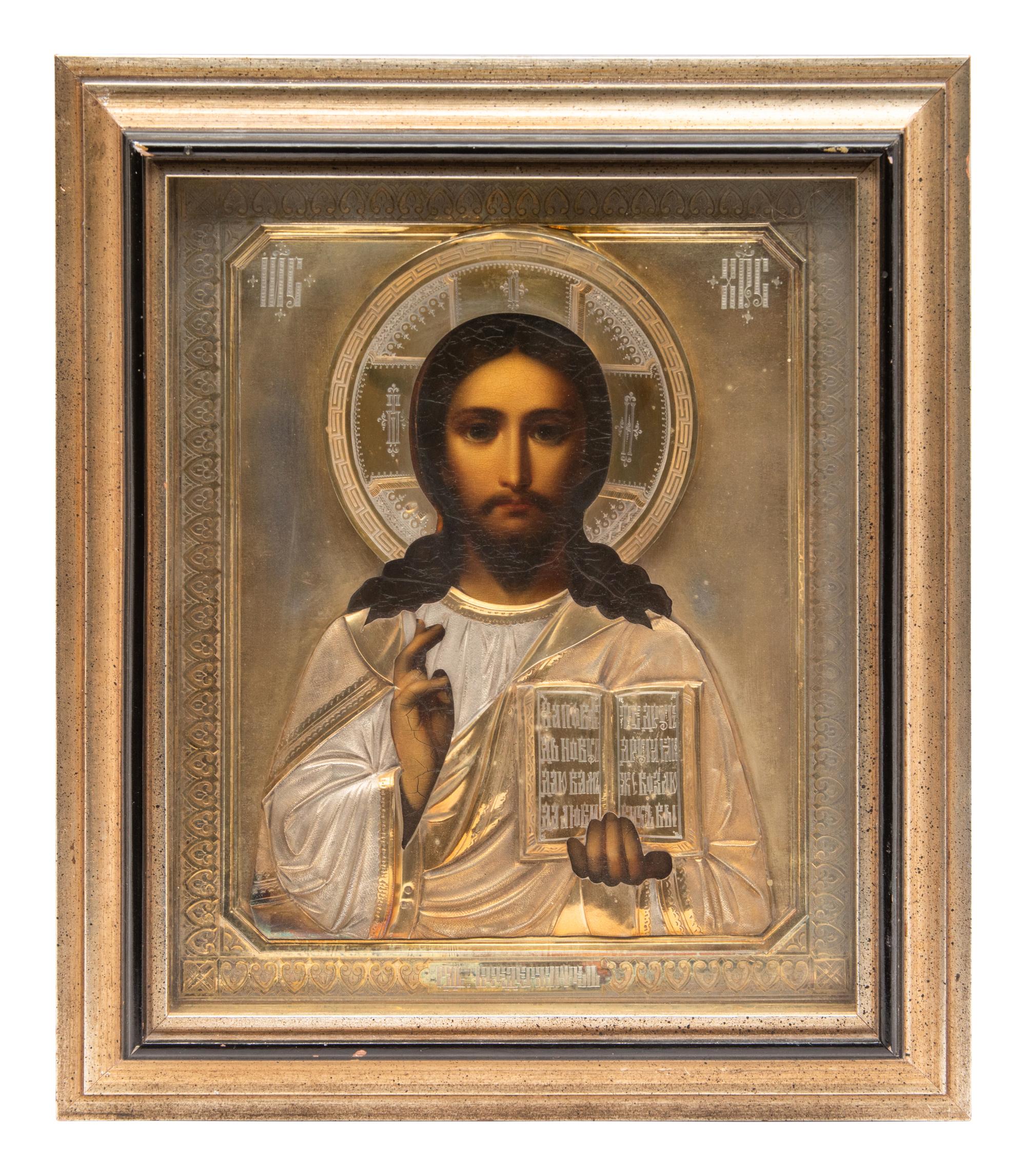 A Group of Three Russian Enameled Oklad Icons