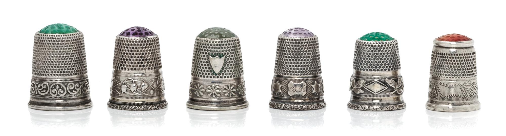 Six Silver and Hardstone Inset Thimbles, , comprising an example with an amethyst inset top above a band having a star motif; a green s