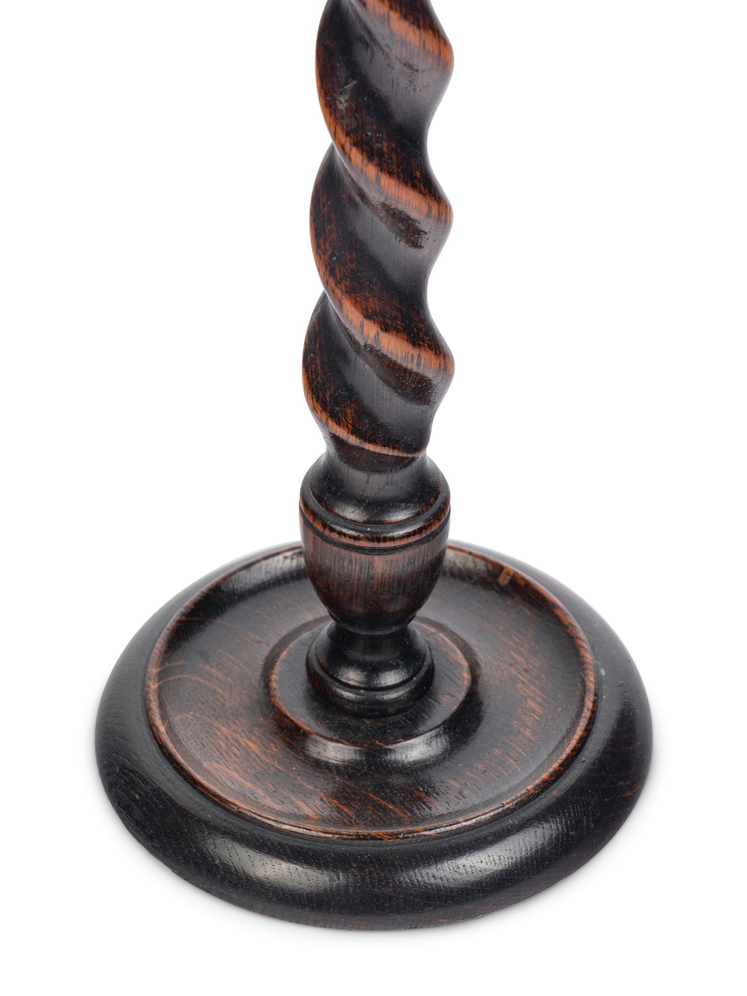 A Pair of Brass-Mounted Oak Barley Twist Candlesticks
