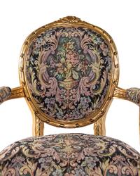 A Set of Four Louis XVI Style Giltwood Fauteuils