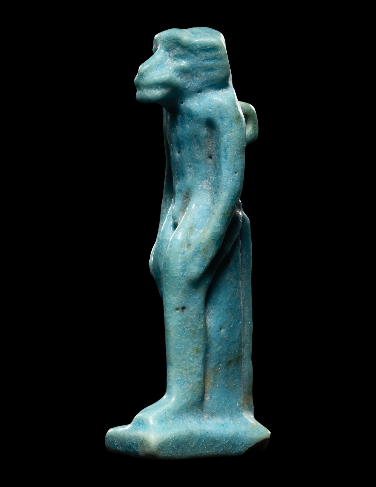 An Egyptian Faience Monkey