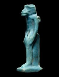 An Egyptian Faience Monkey
