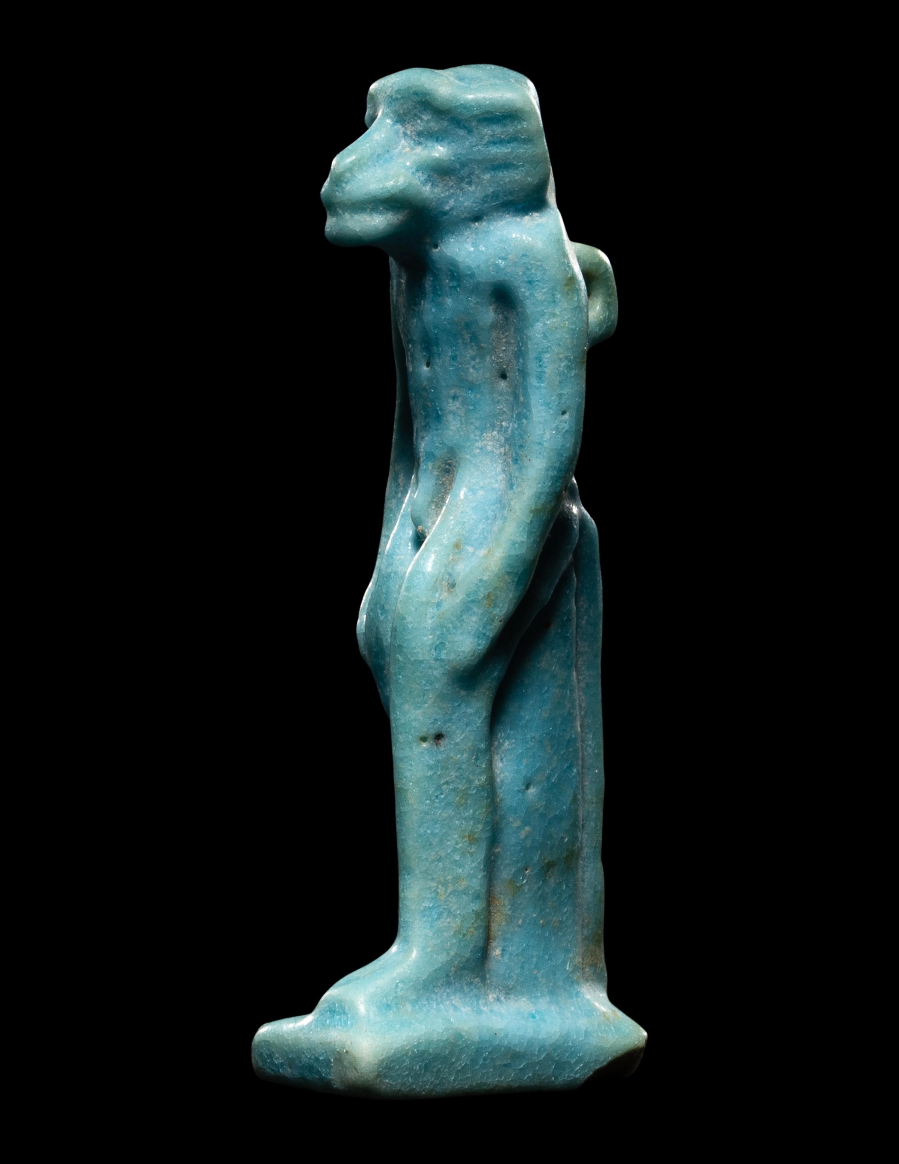 An Egyptian Faience Monkey