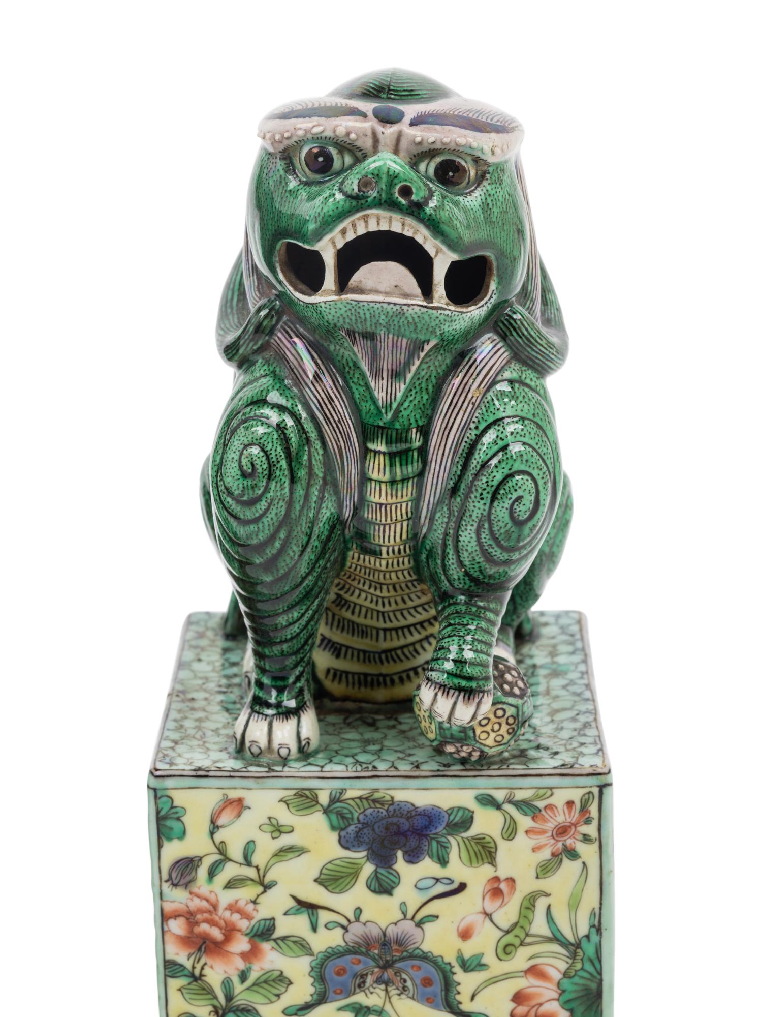 A Pair of Famille Verte Porcelain Figures of Fu Lions