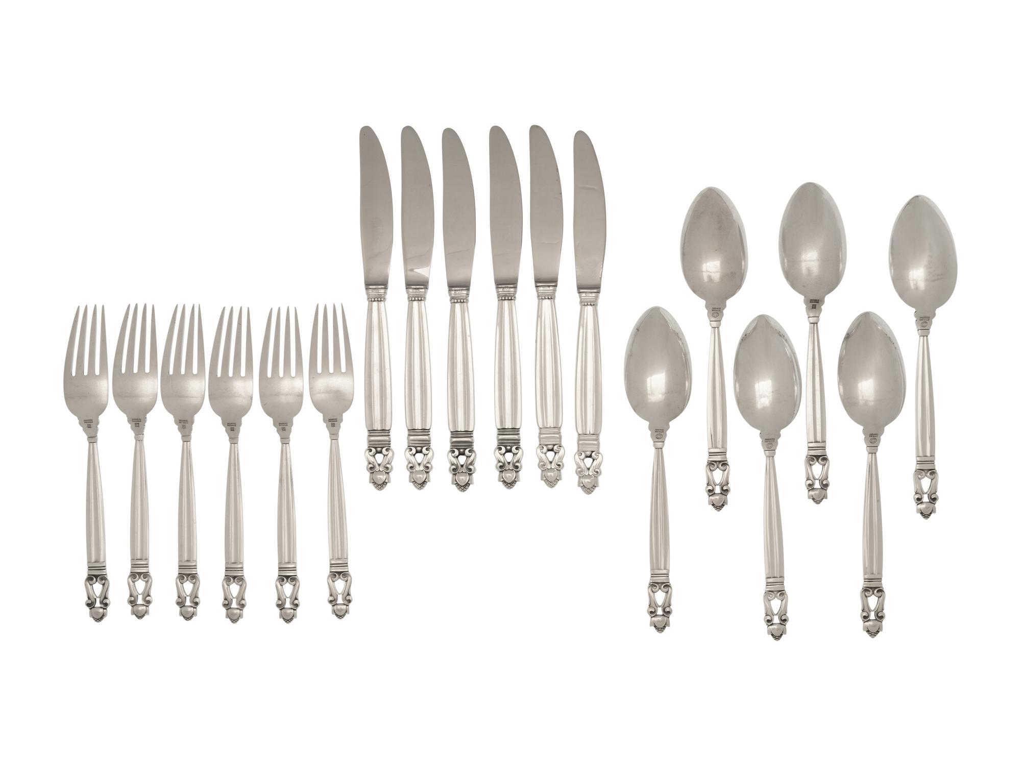 A Set of Eighteen Georg Jensen Acorn Silver Flatware Articles