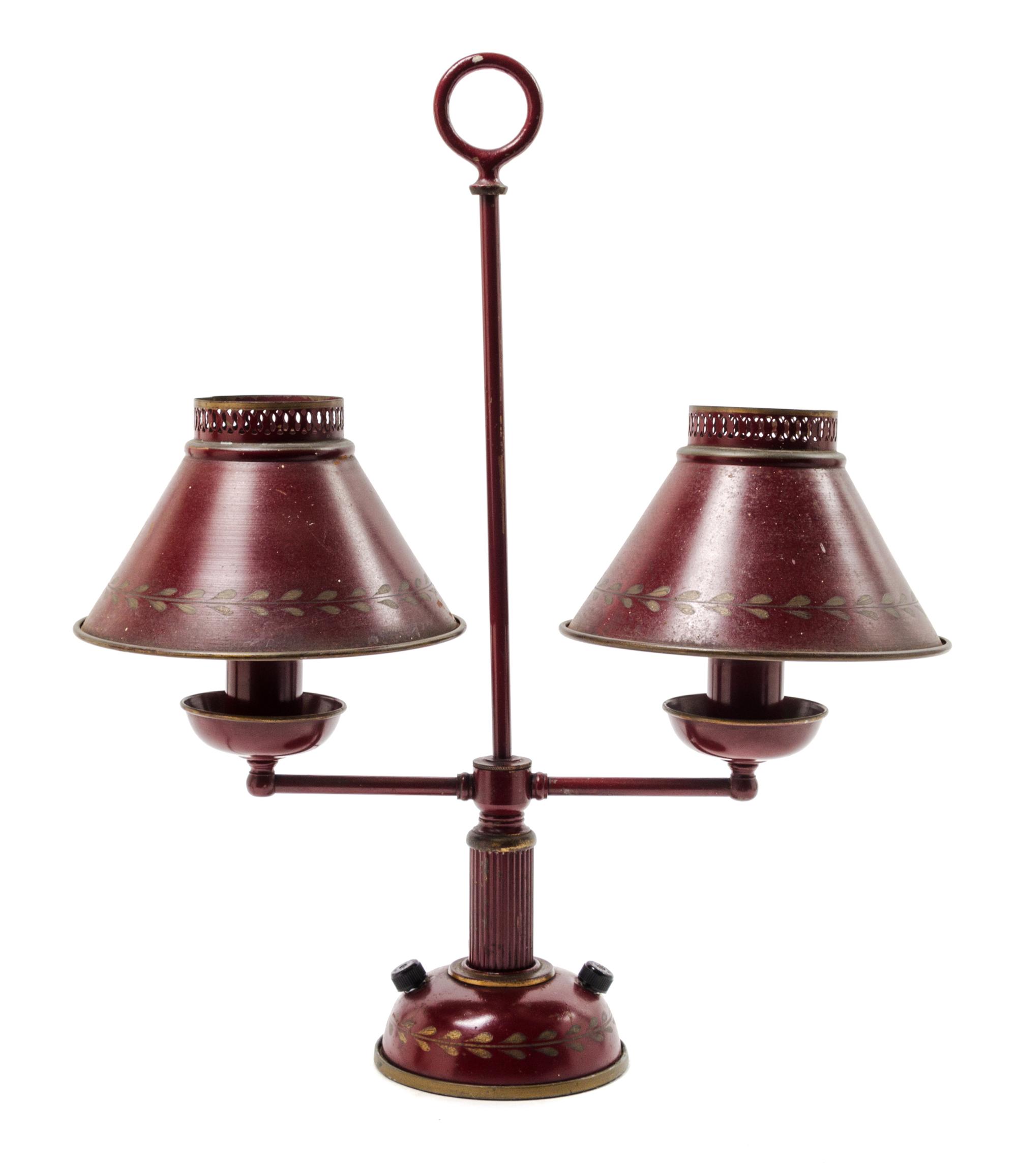 A Red and Gilt-Decorated Tole Two-Light Lamp Height 19 inches.