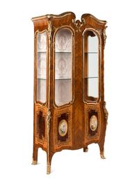 A Pair of Louis XV Style Gilt Bronze Mounted Tulipwood Vitrine Cabinets