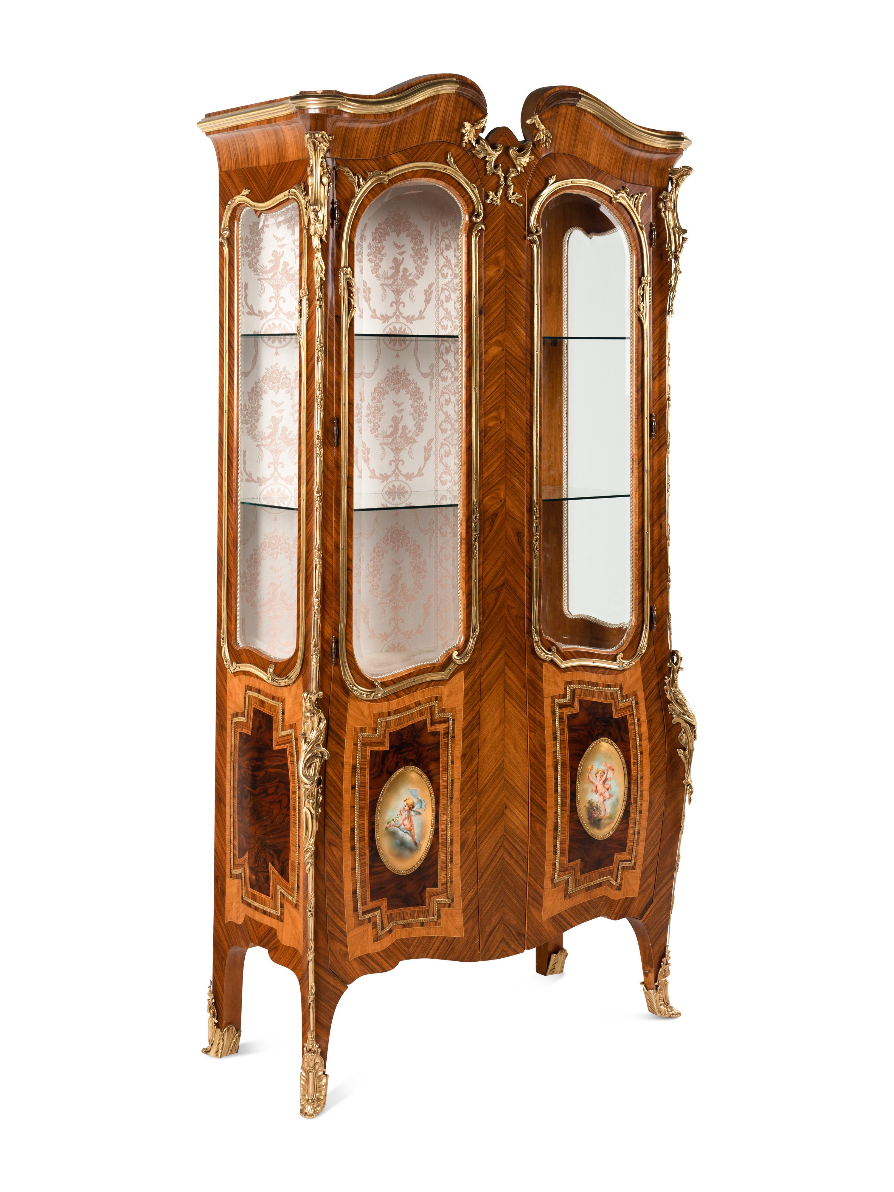 A Pair of Louis XV Style Gilt Bronze Mounted Tulipwood Vitrine Cabinets