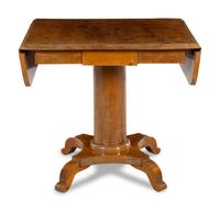 A Biedermeier Walnut Drop-Leaf Center Table
