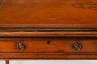 An Edwardian Mahogany Writing Table — CIRCA 1900