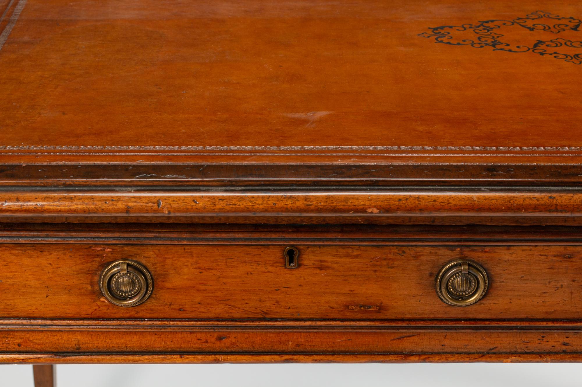 An Edwardian Mahogany Writing Table — CIRCA 1900