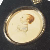 A group of three silhouettes and one portrait miniature of children 19th century