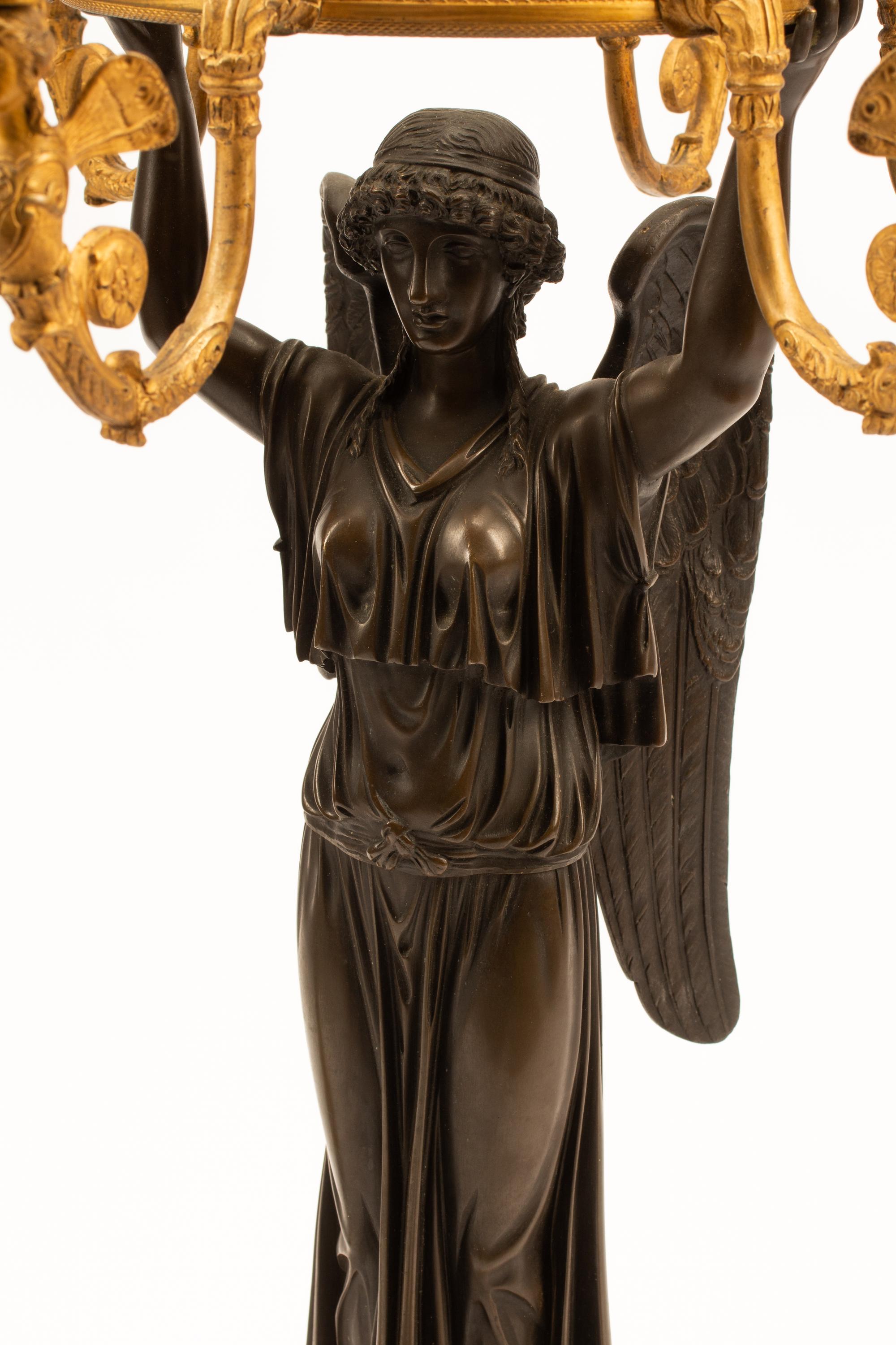 A Pair of Empire Style Gilt and Patinated Bronze Figural Candelabra with Cut Glass Cache Pots
