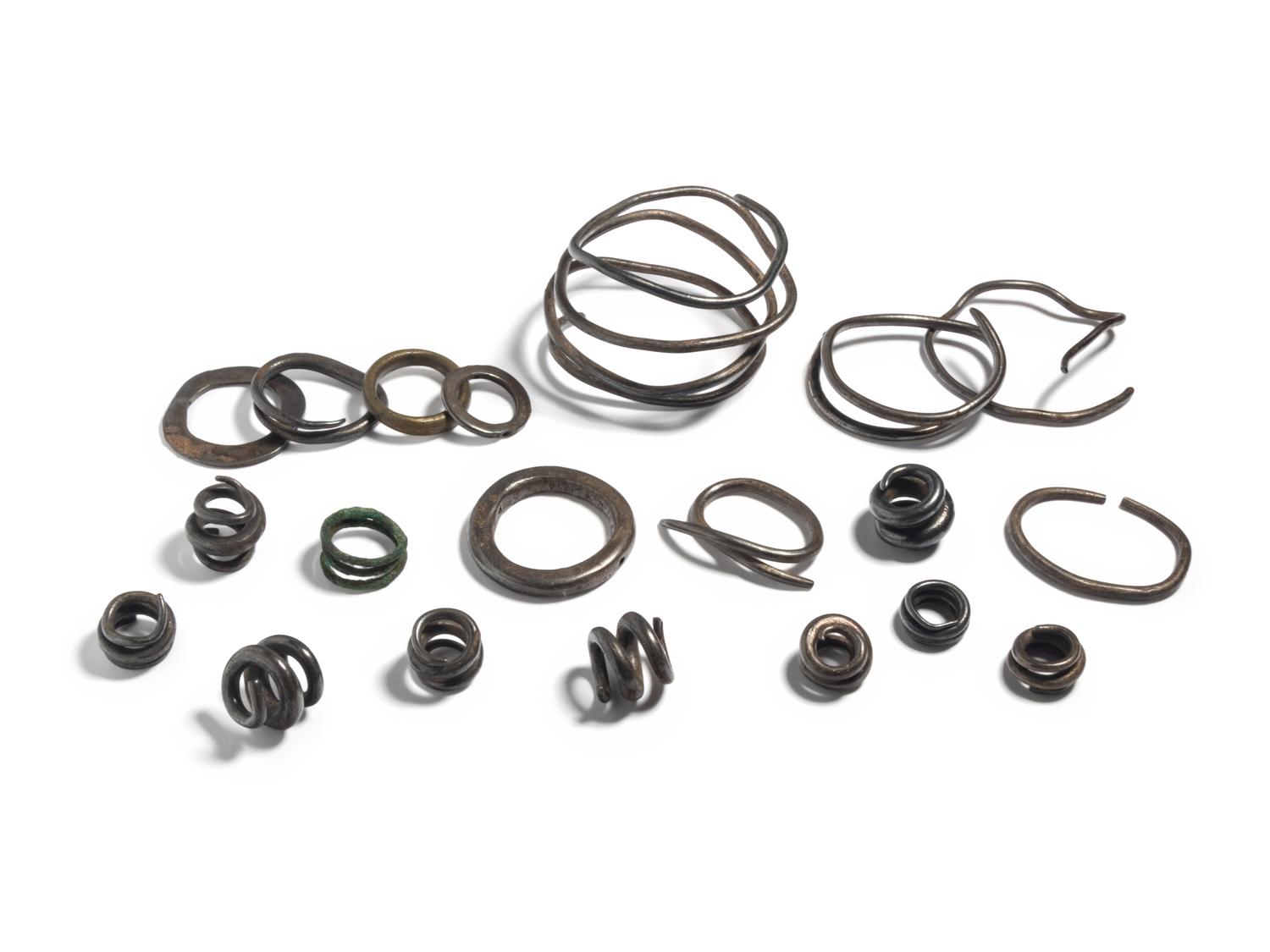 A Collection of European Bronze Age Jewelry — (solid silver hair rings and arm bands)