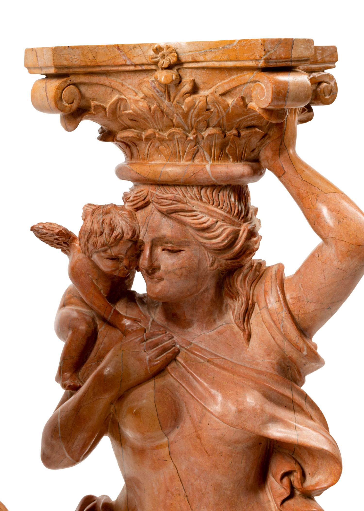 A Pair of Carved Marble Figural Pedestals