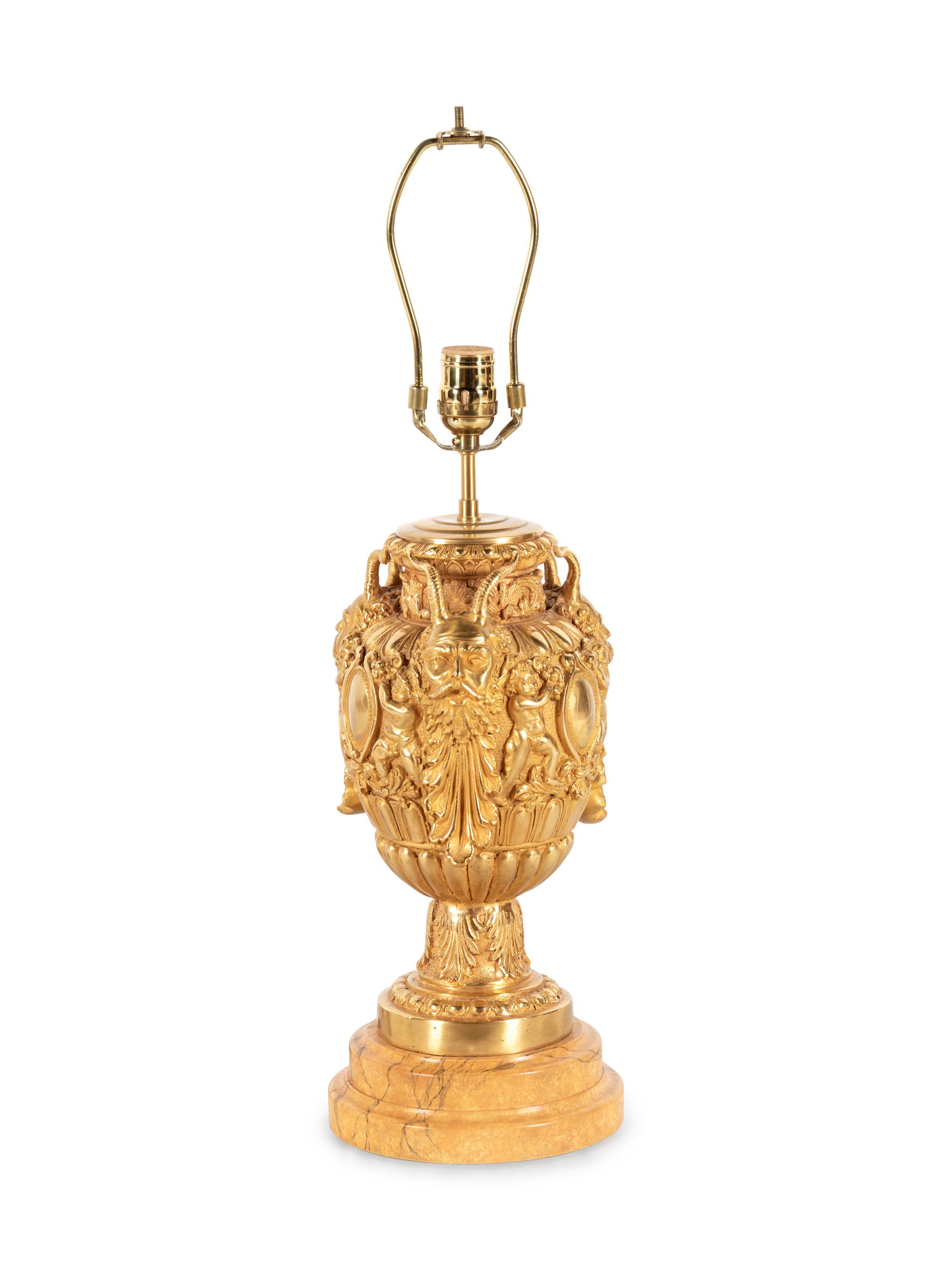 A Neoclassical Gilt Bronze Mask-Decorated Urn
