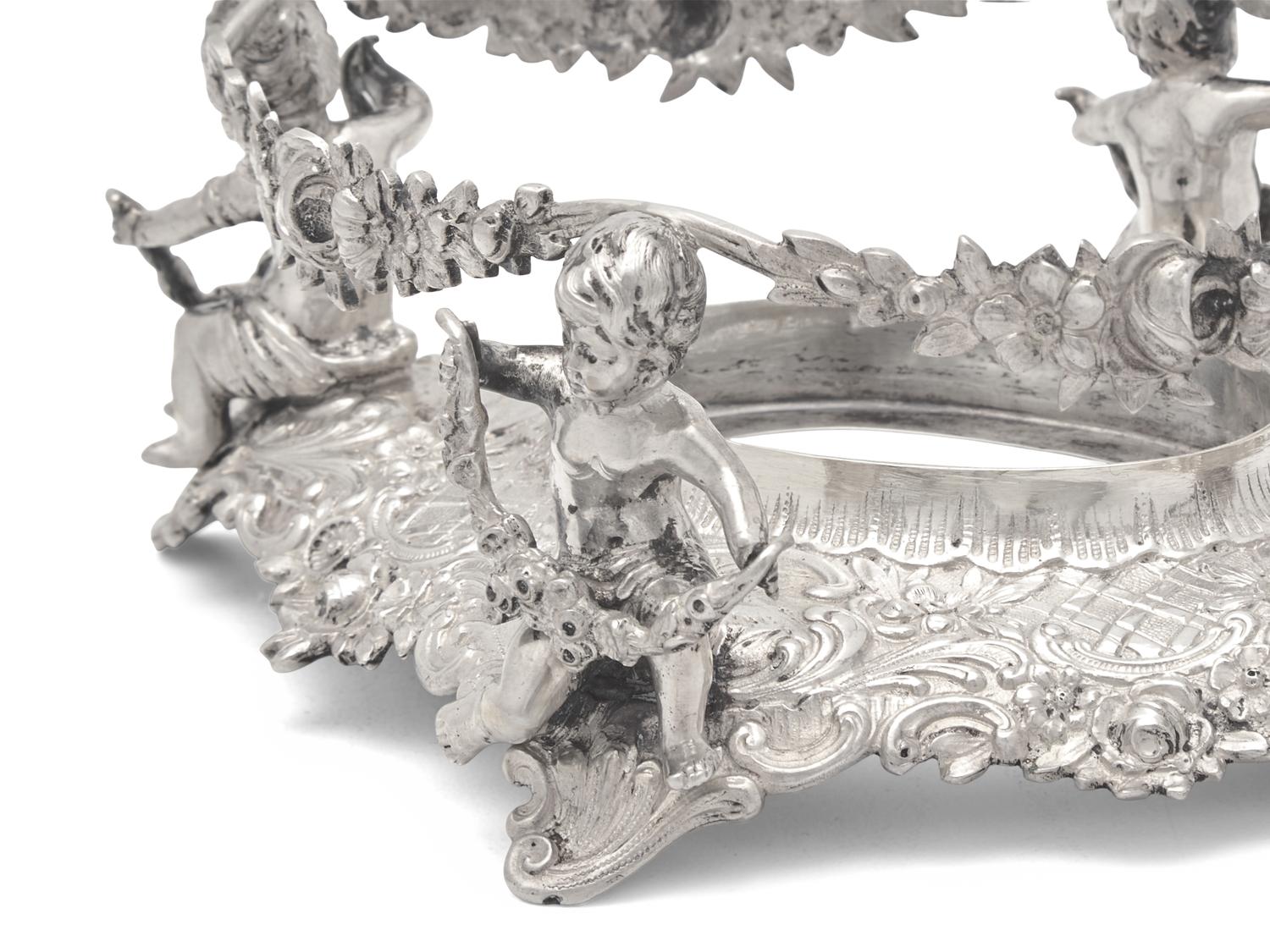 A German Silver Five-Piece "Putti" Table Garniture