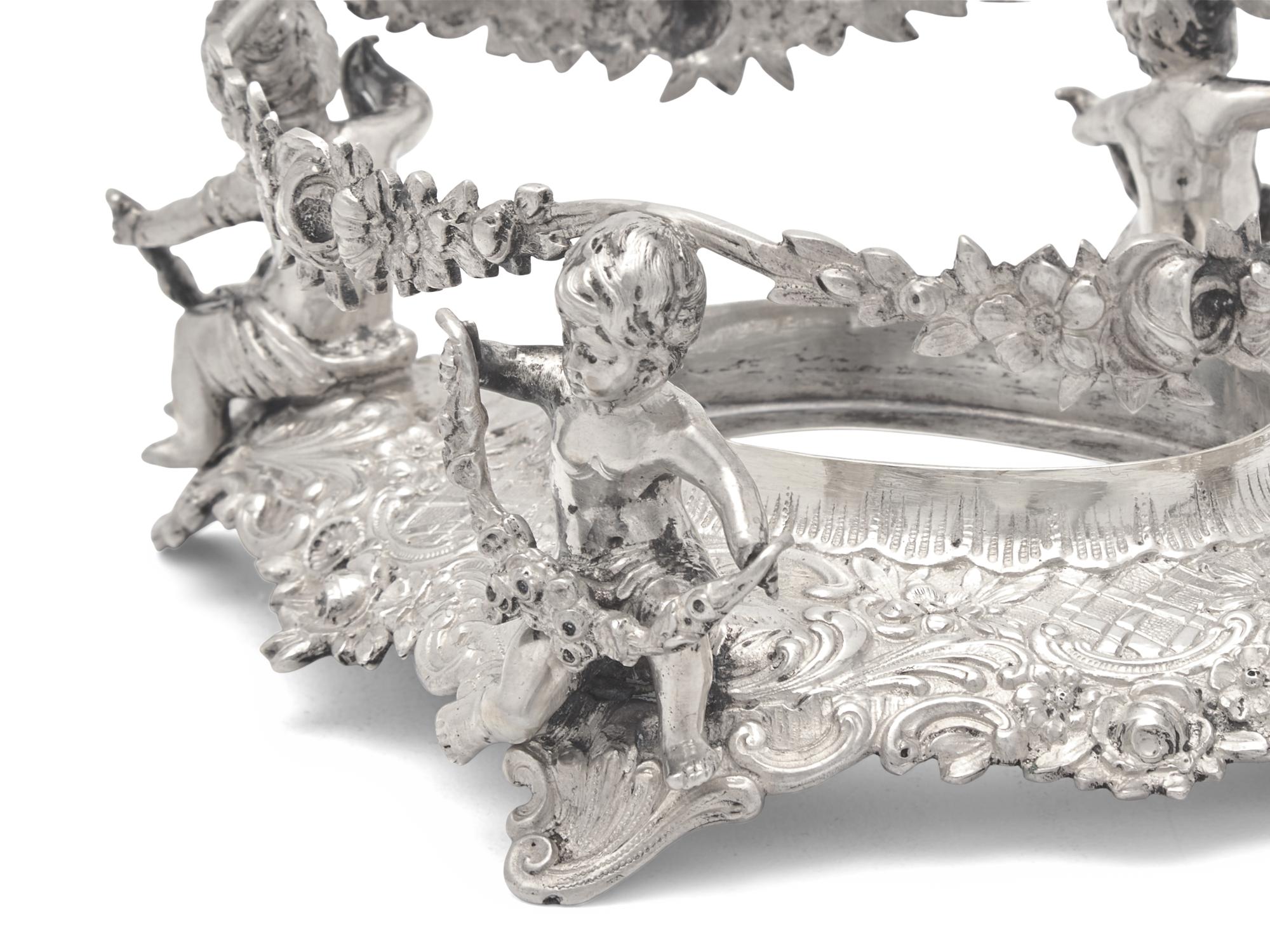 A German Silver Five-Piece "Putti" Table Garniture