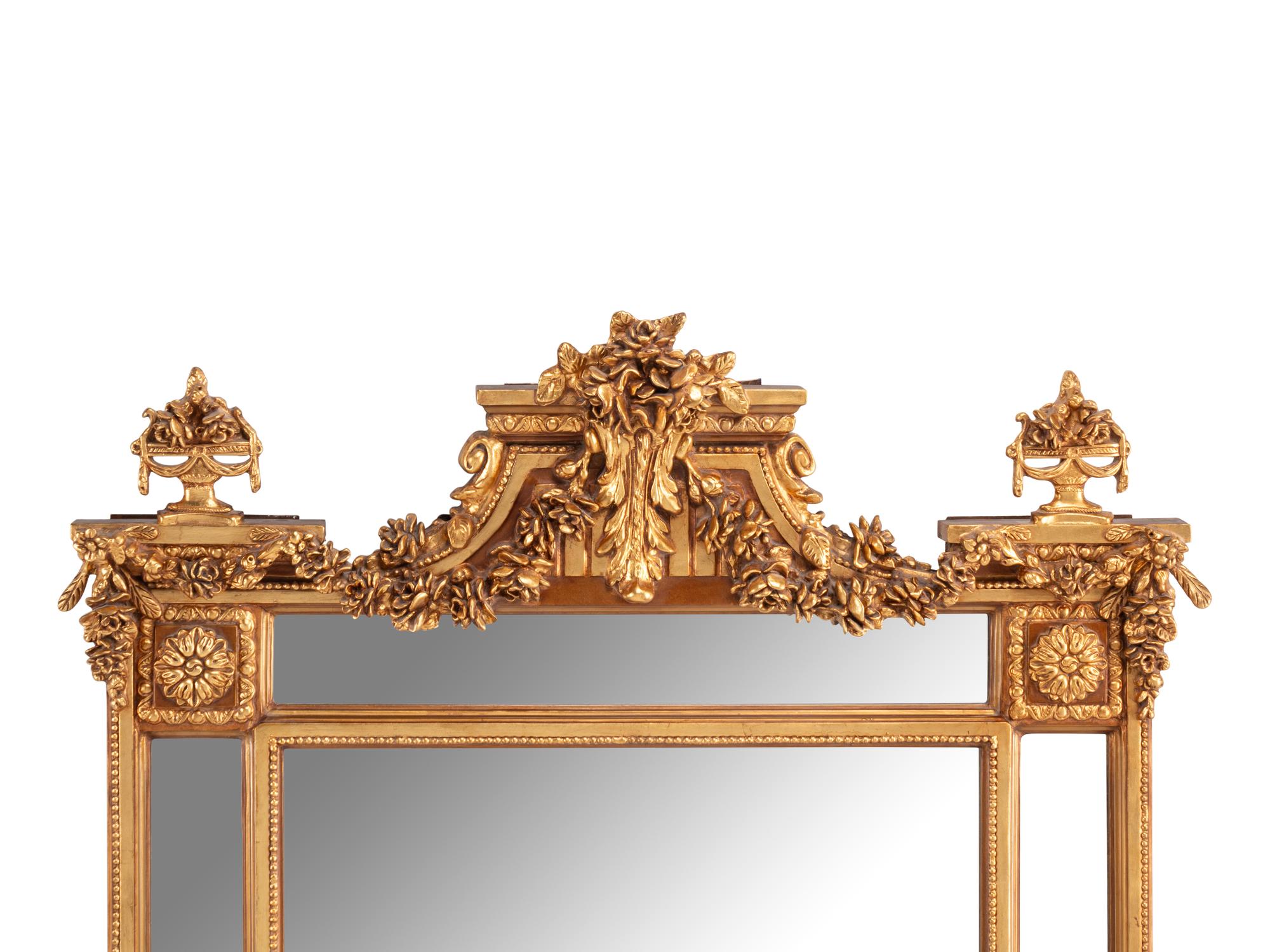 A Pair of Louis XVI Style Gilt Composition Mirrors
