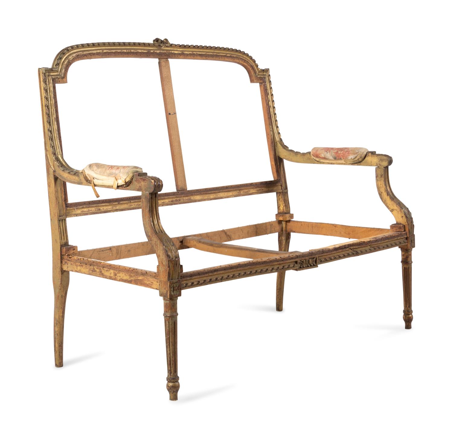 A Louis XVI Giltwood Settee Frame