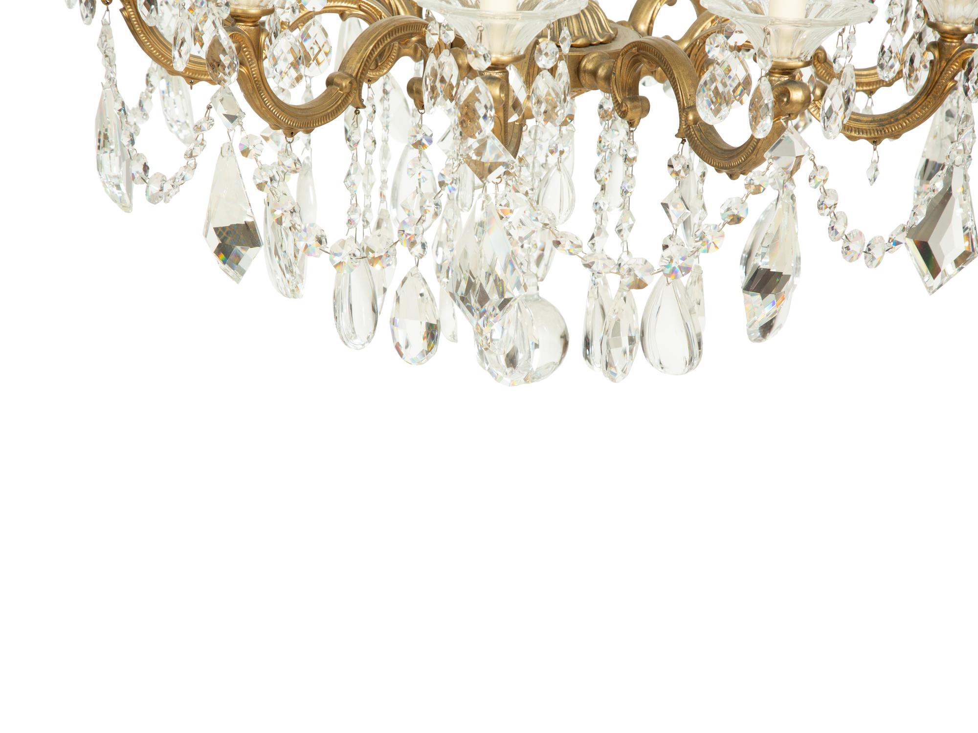 An Empire Style Gilt Metal and Glass Ten-Light Chandelier