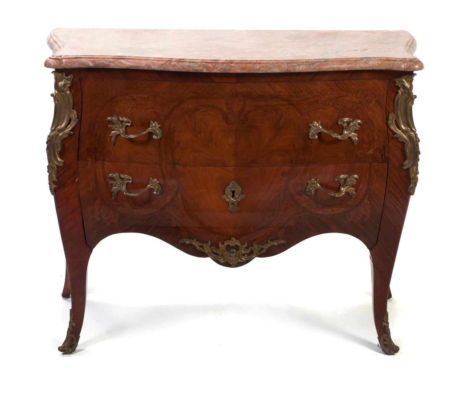 A Louis XV Style Gilt Bronze Mounted Walnut Bombe Commode, Height 36 x width 41 1/2 x depth 18 inches.