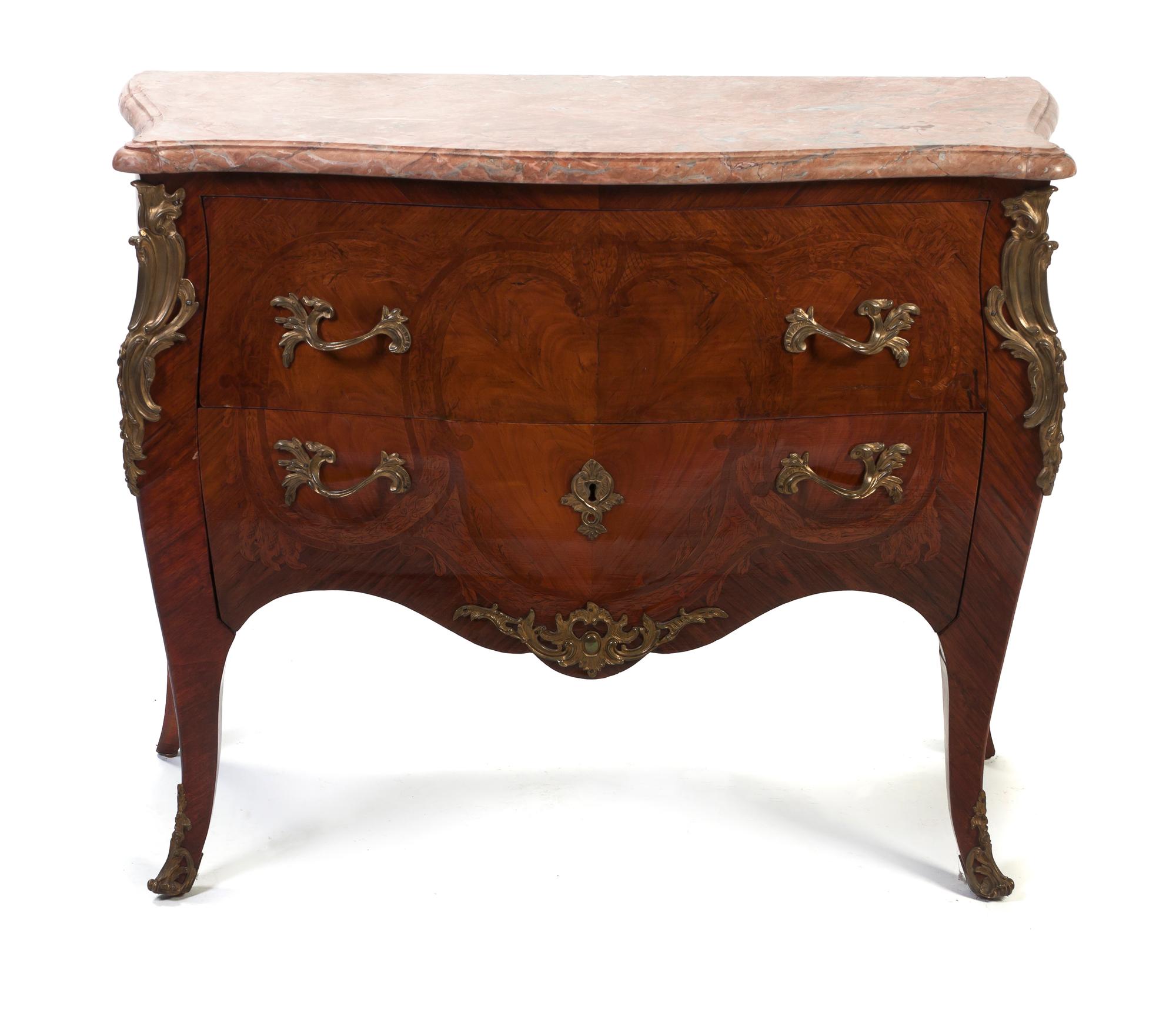 A Louis XV Style Gilt Bronze Mounted Walnut Bombe Commode, Height 36 x width 41 1/2 x depth 18 inches.