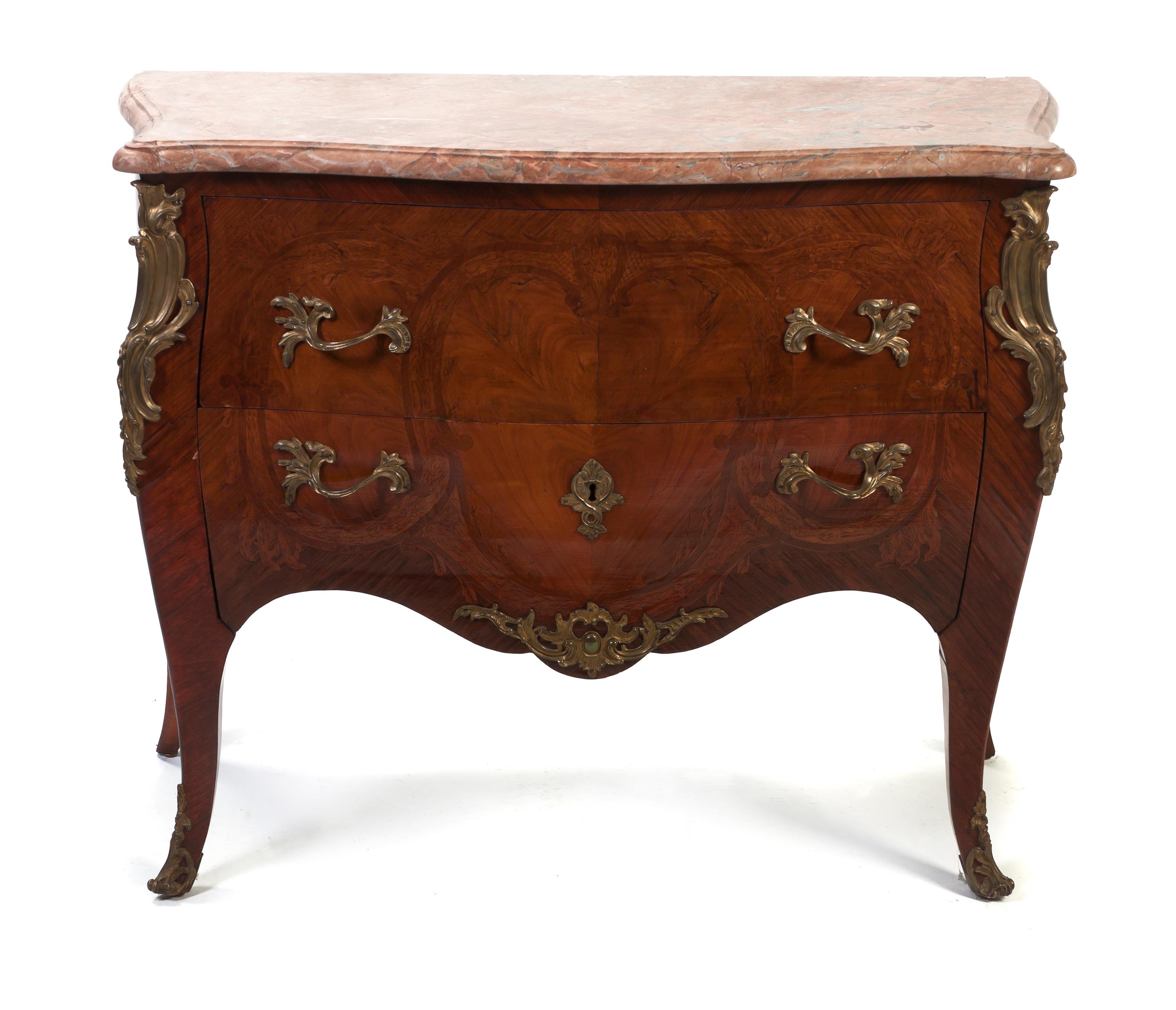 A Louis XV Style Gilt Bronze Mounted Walnut Bombe Commode, Height 36 x width 41 1/2 x depth 18 inches.