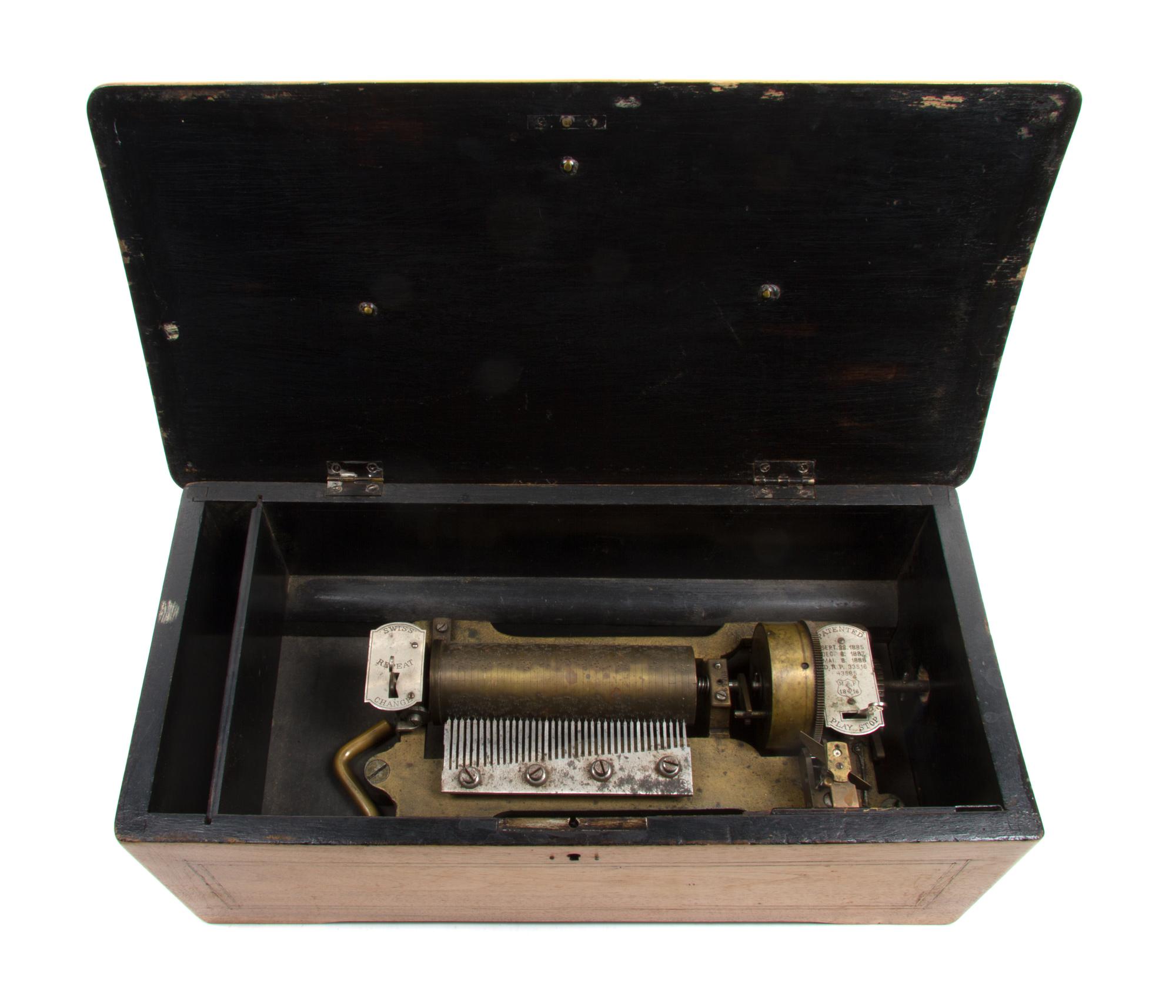 A Swiss Cylinder Music Box Width overall 17 1/2 inches. — MERMOD FRERES