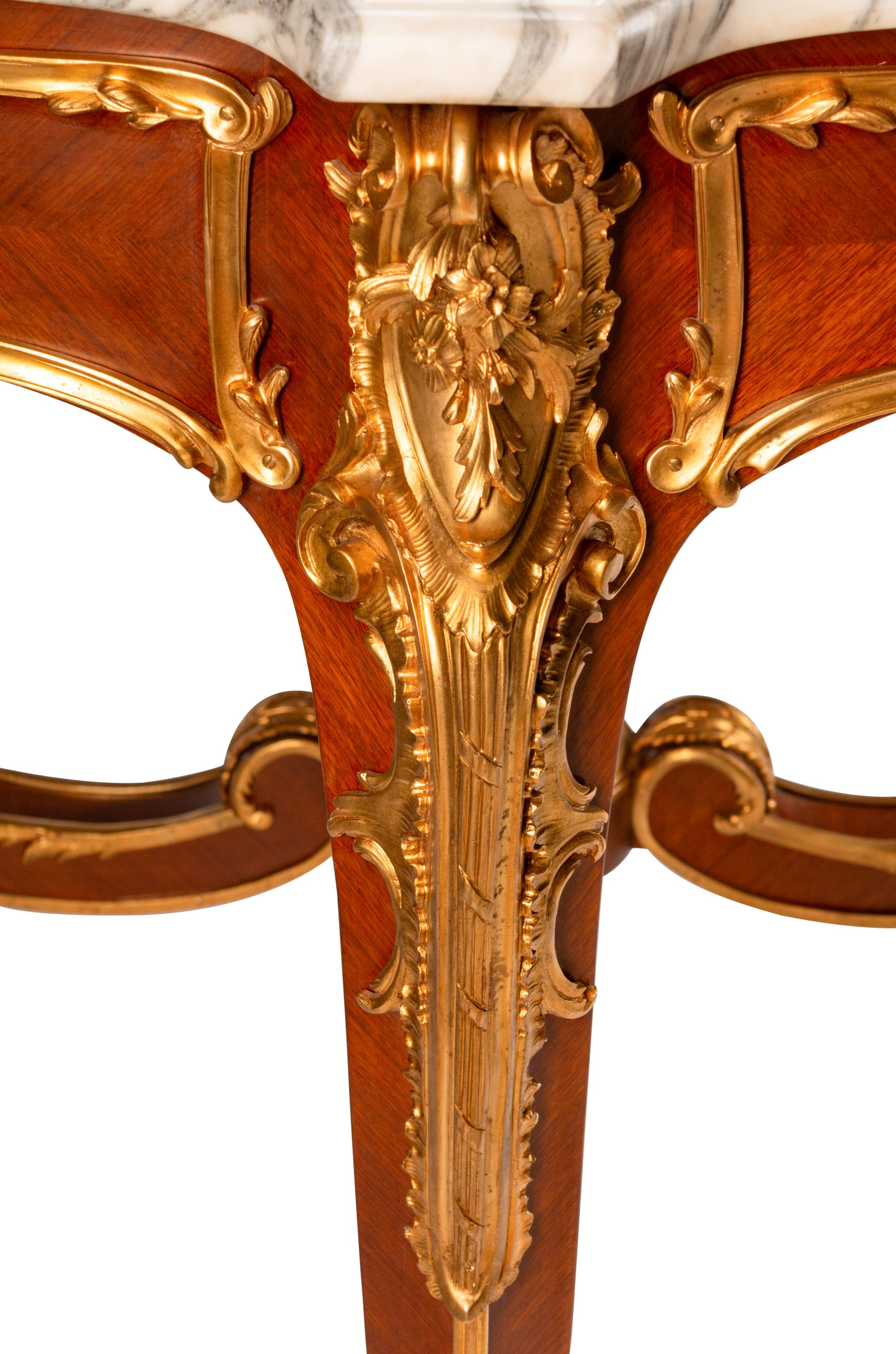 A Louis XV Style Gilt-Bronze-Mounted Kingwood Table de Milieu