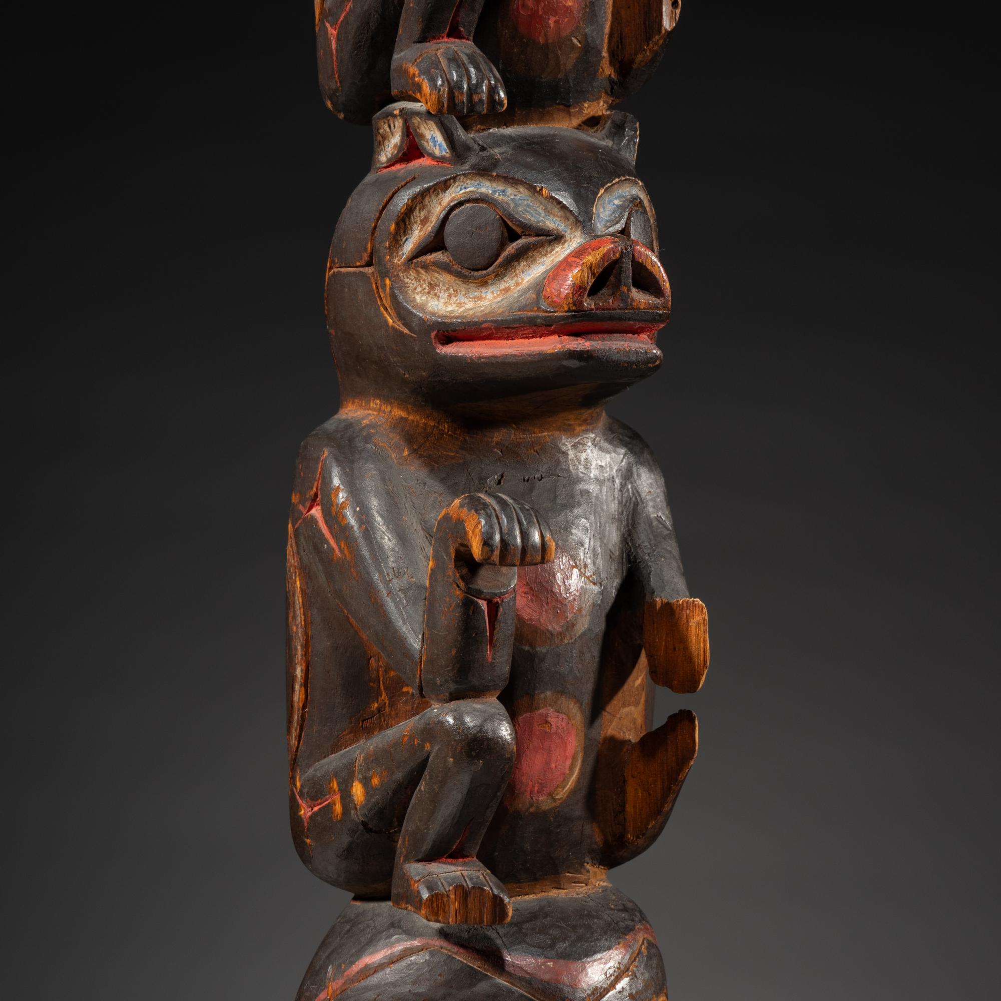 Haida Carved Totem Pole and Bear Cub