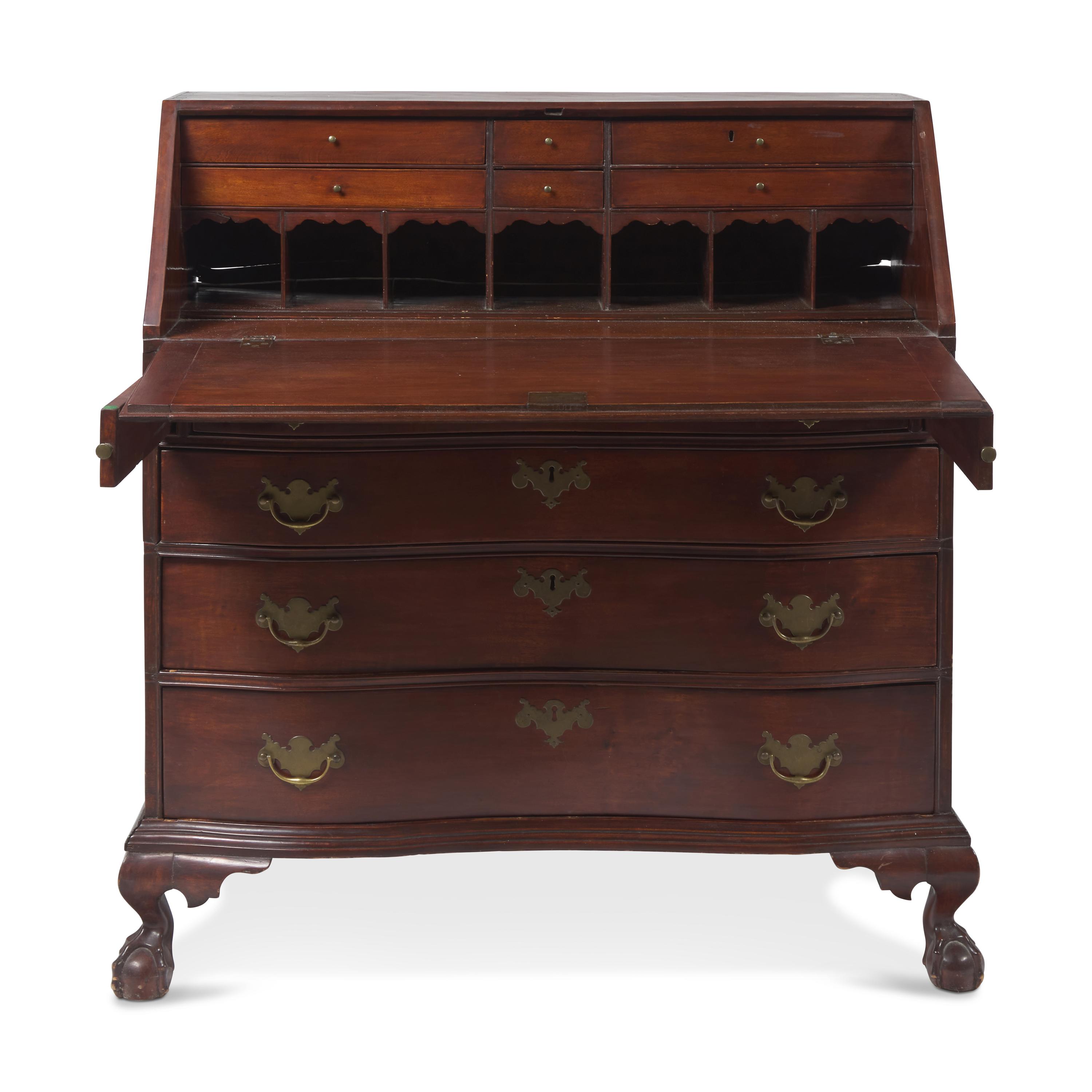 A Chippendale Carved Mahogany Oxbow Slant-Front Desk
