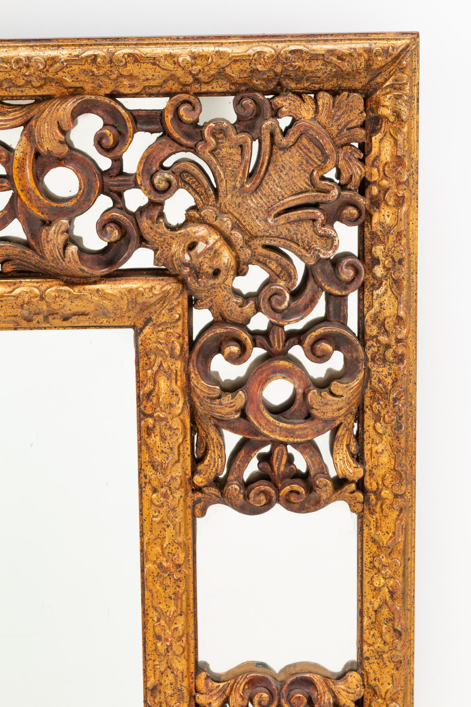 A Spanish Baroque Style Giltwood Mirror