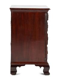 A Chippendale Carved and Figured Mahogany Chest of Drawers
