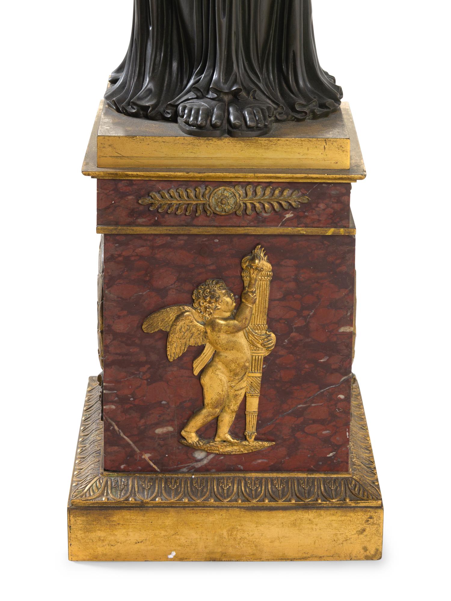 A Pair of Large Empire Style Gilt and Patinated Bronze and Marble Figural Candelabra Bases