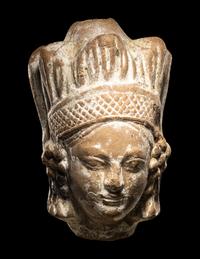 A Ghandaran Terracotta Head of a Woman
