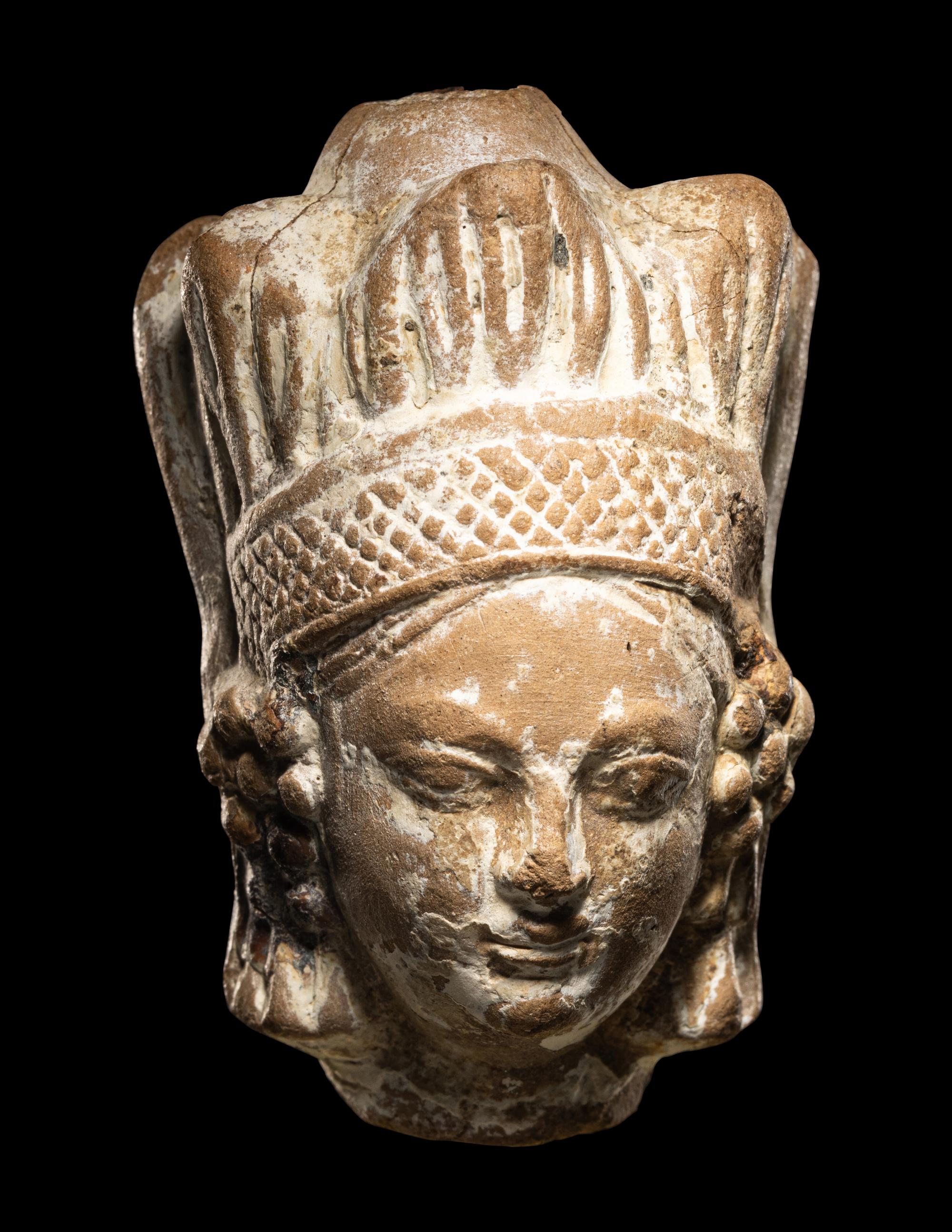 A Ghandaran Terracotta Head of a Woman