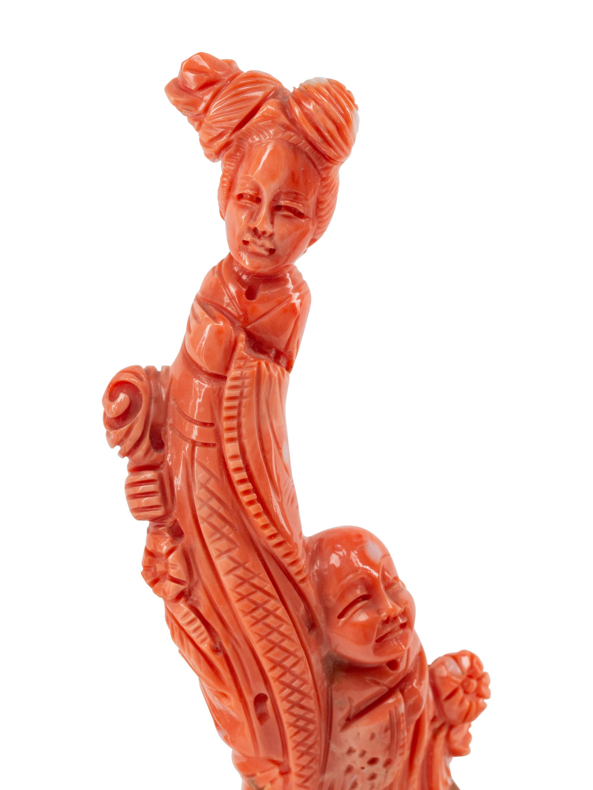 Three Chinese Carved Coral Figures on Wood Stands