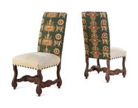 A Set of Eight Louis XIII Style Upholstered Dining Chairs