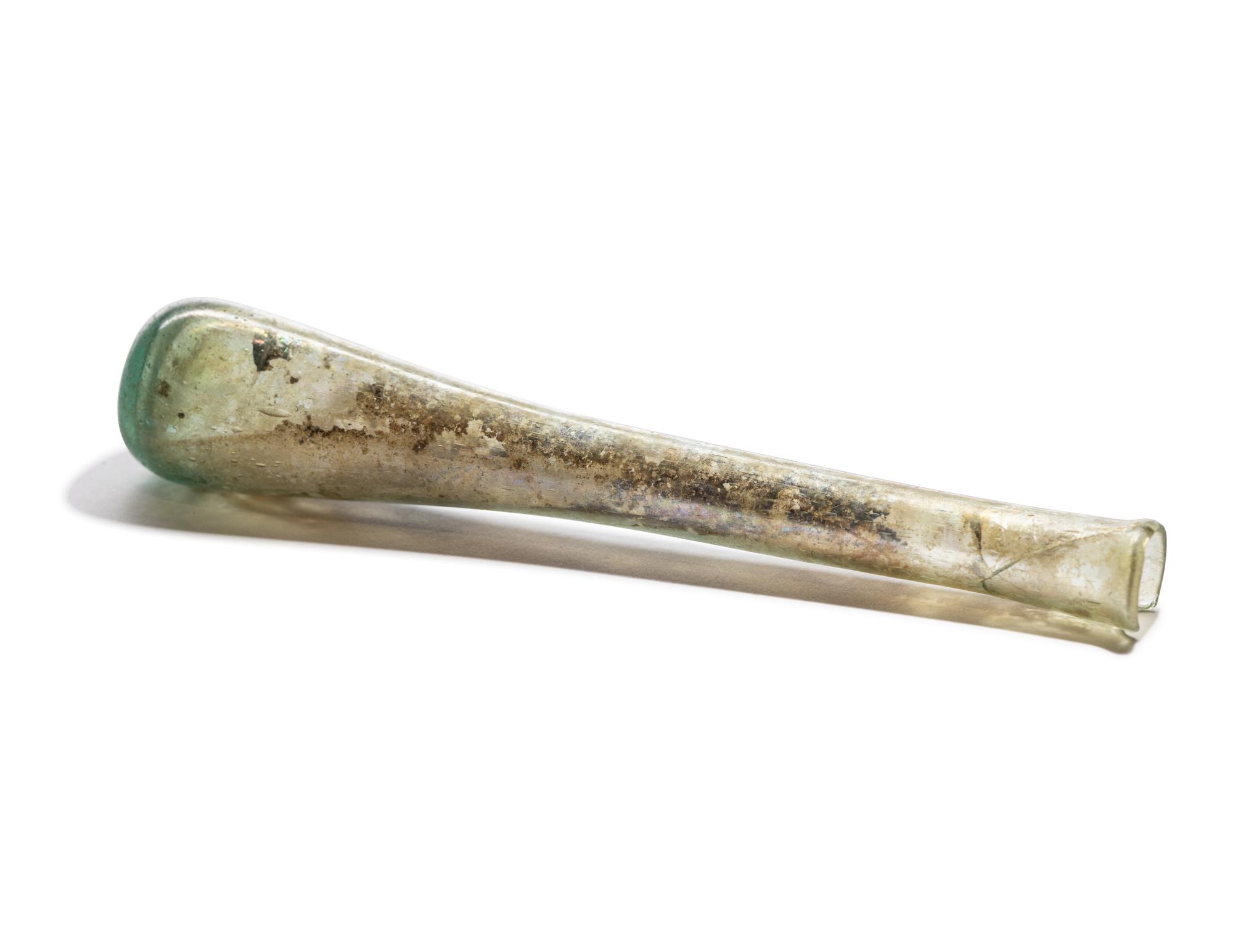 A Roman Pale Blue Glass Flask